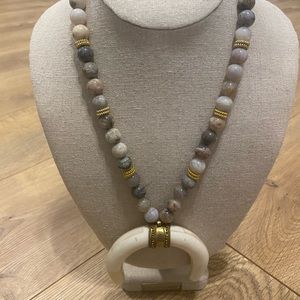 Beaded necklace with horn